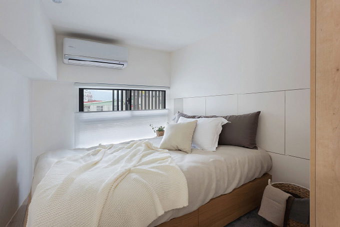 卧室的设计，给人的第一印象就是简单干净，虽然空间狭小，但是做到了合理的规划设计，营造出一种温馨的氛围。
